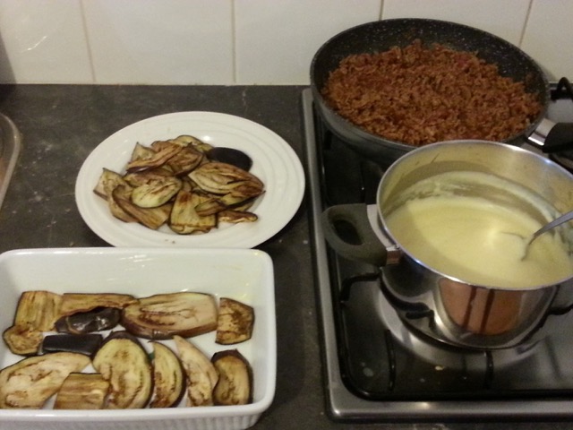 Eggplant an sauces ready for layering