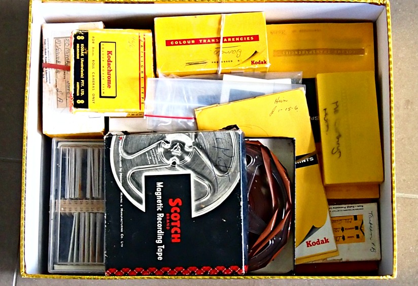 Box of slides and its mystery film.