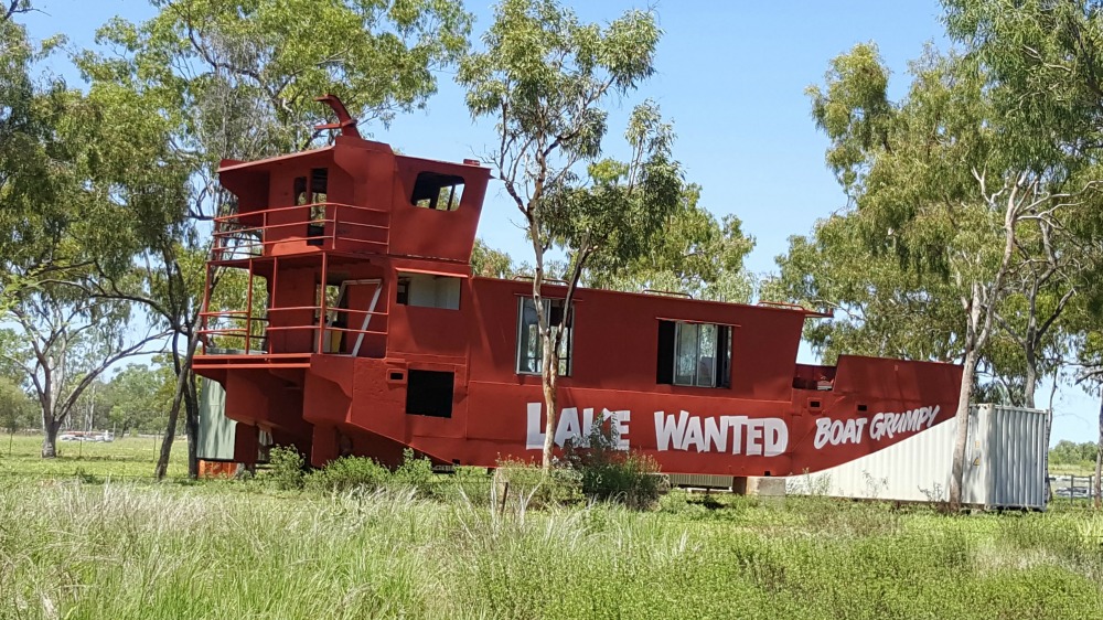 Grounded! The writing on the boat reads: Lake Wanted, Boat Grumpy. Cracks me up.