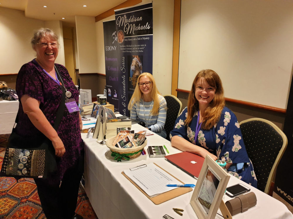 Authors Maddison Micheals, Amanda Knight and (standing) Bronwyn Parry at ARR19, Sydney.